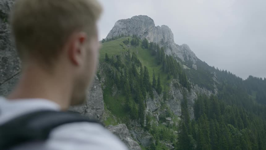 A hiker viewing a landscape view