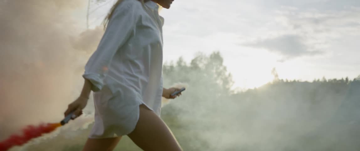 A female running with flares
