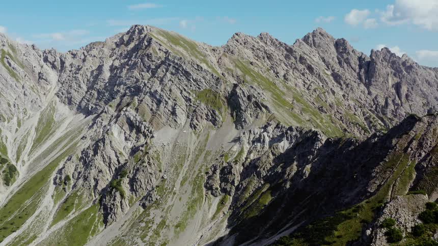 A scenery of a mountain range peak