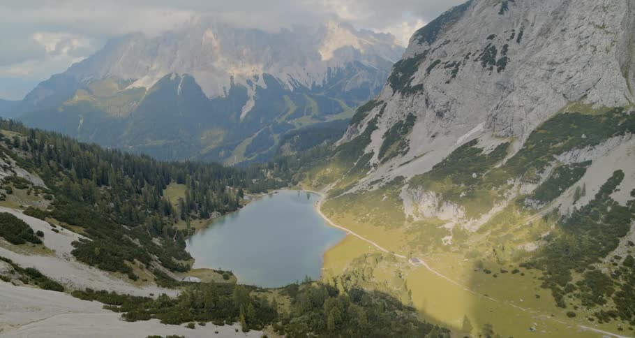 Aerial view of a lake in the middle of a mountain