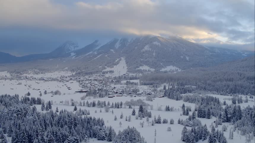 An aerial footage of a forest at winter