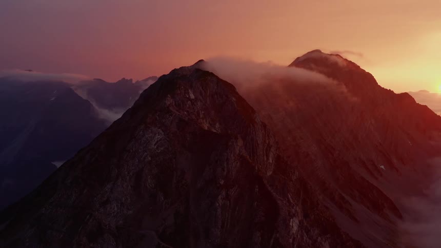 Aerial view of clouds on tops of the mountains