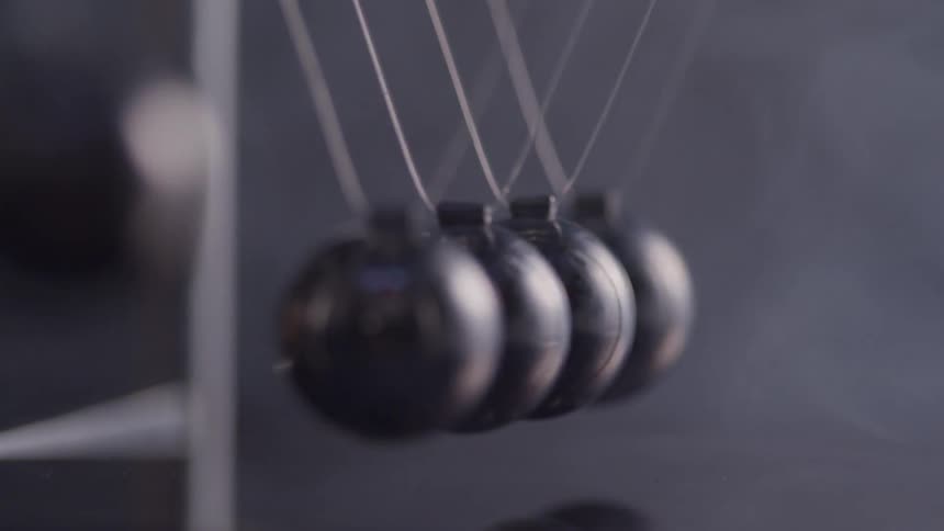 A ball on a rope hit each other
