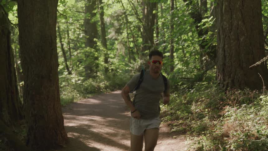 A man running in the forest