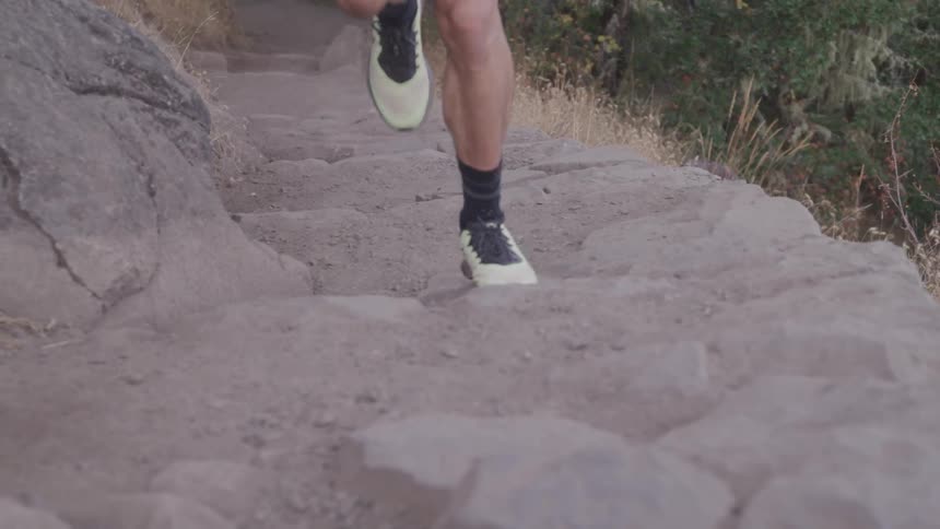 Person running on rocky terrain