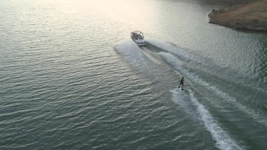 A man playing jet ski at lake