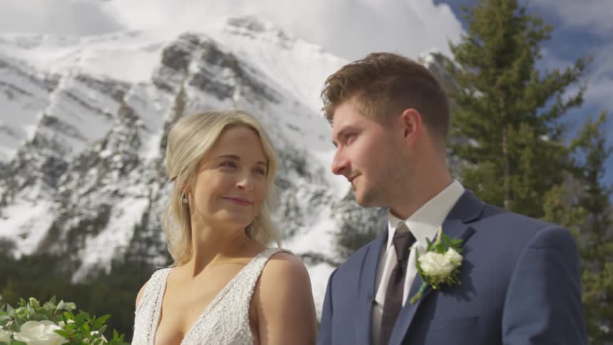 Couple glancing at each other while walking