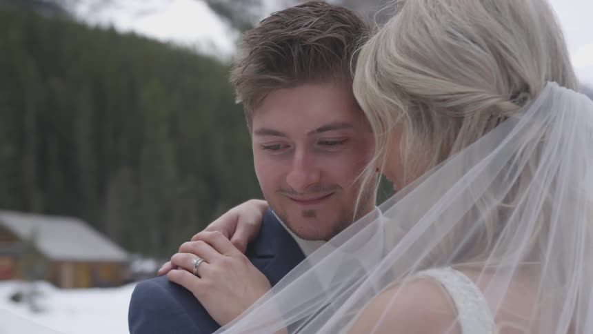 Bride and groom hugging each other