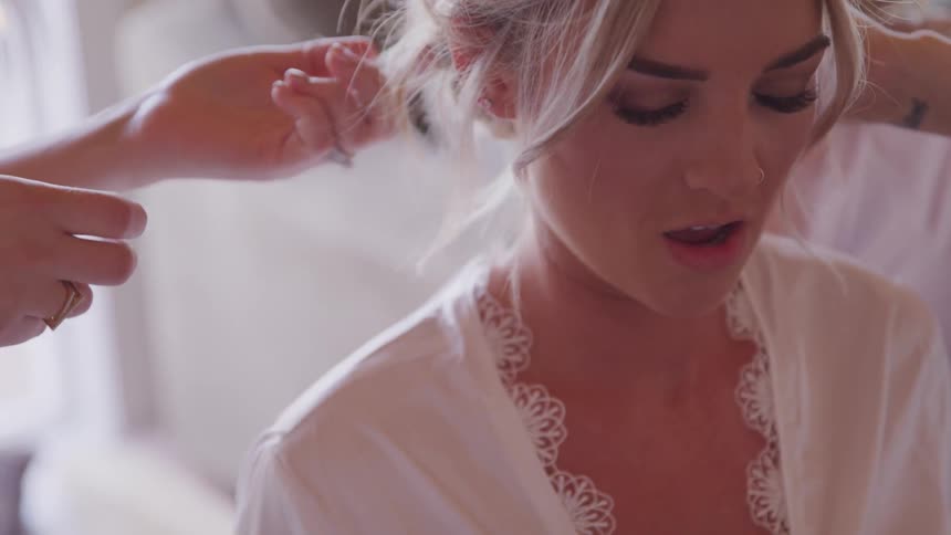 A groom being prepared for the event