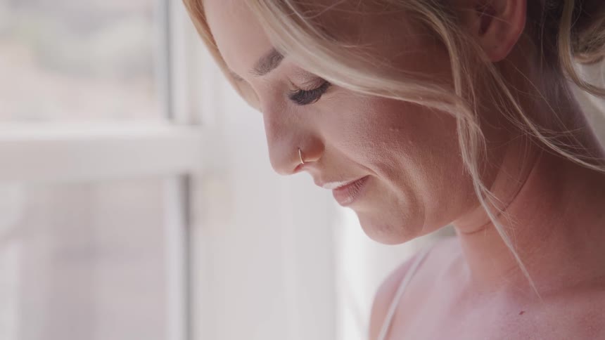 A portrait of a woman looking down