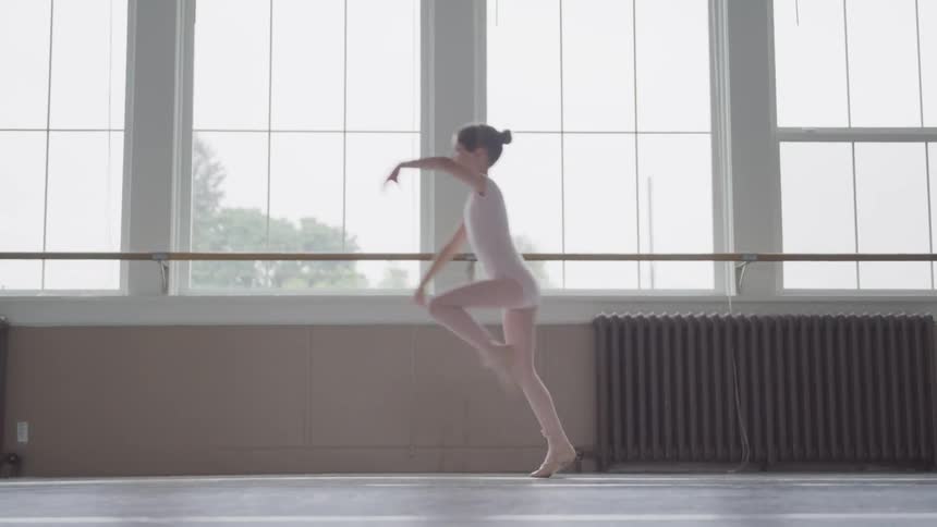 A ballerina exercising