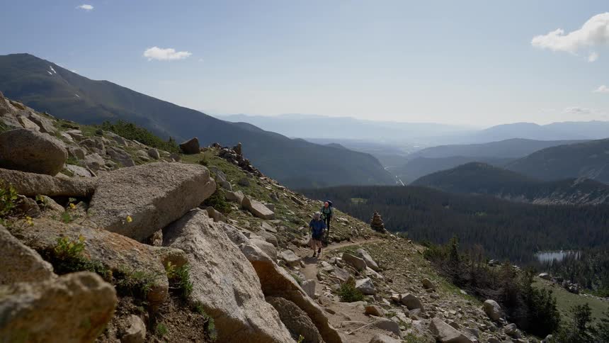 A man climbing on a rocky mountain
