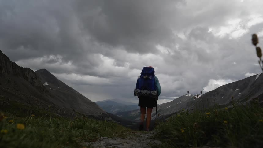 A couple hiking at cloudy day
