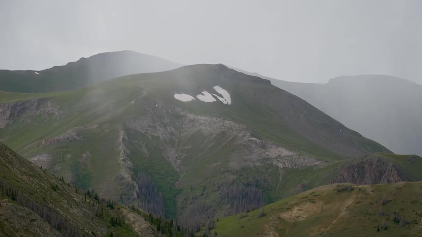 Rain falling on a mountain