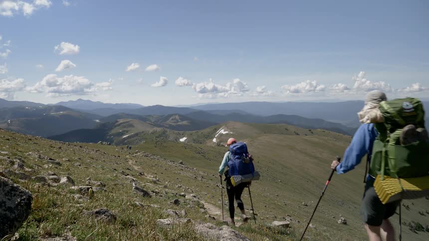 A man and woman hike