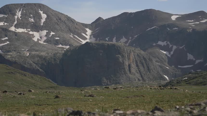 A mountain ridge with snow