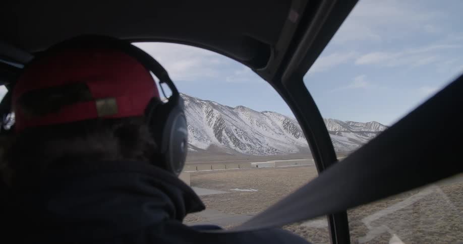 A person flying a plane