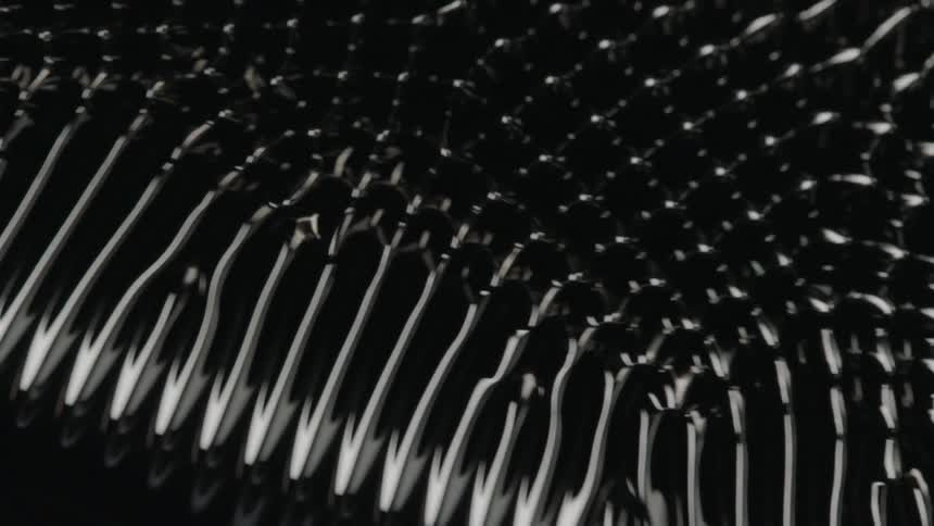 Black magnetic liquid moving in a pattern