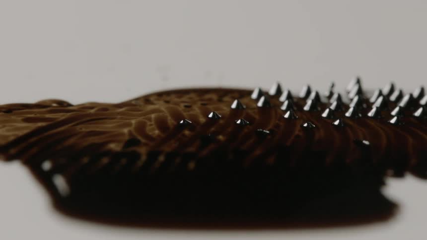 Magnetic liquid forms patterns on a table
