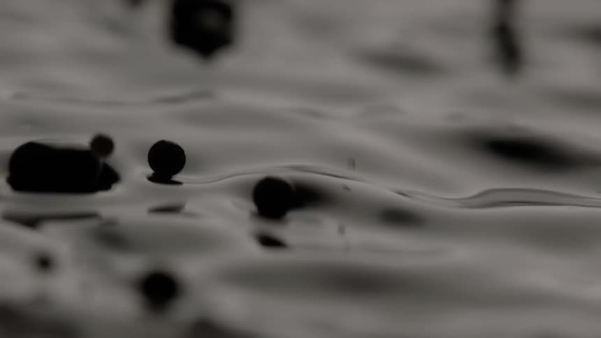 Dark liquid moves and bubbles