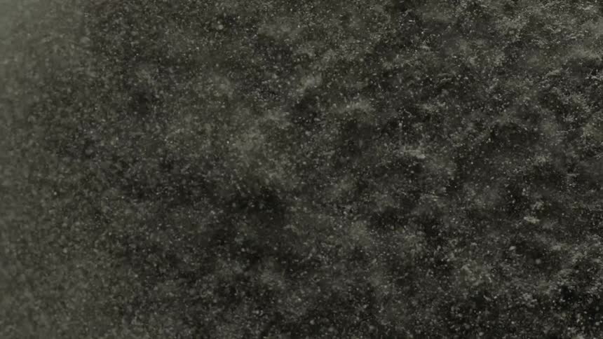 A shaking black powder