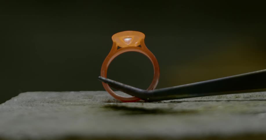 Needle nose pliers hold ring for torch flame