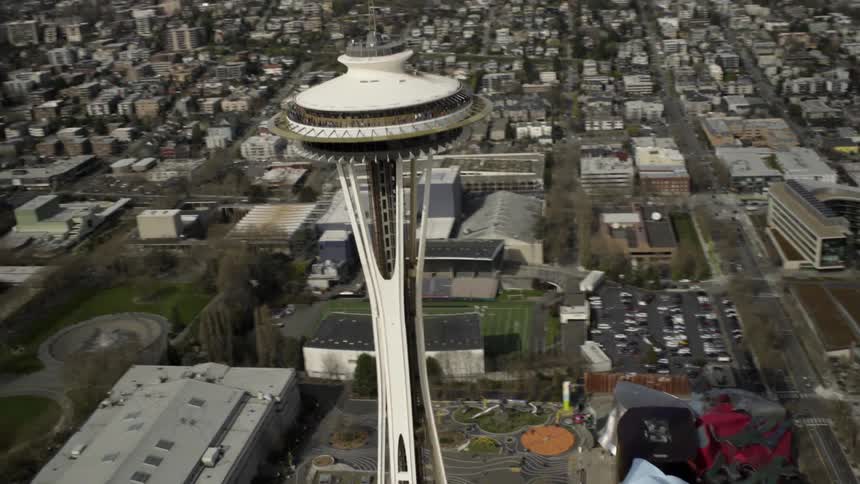 The space needle stands tall in the city