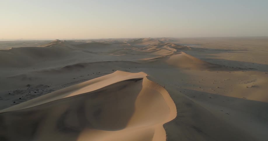 Aerial view of dunes of sand on a desert landscape
