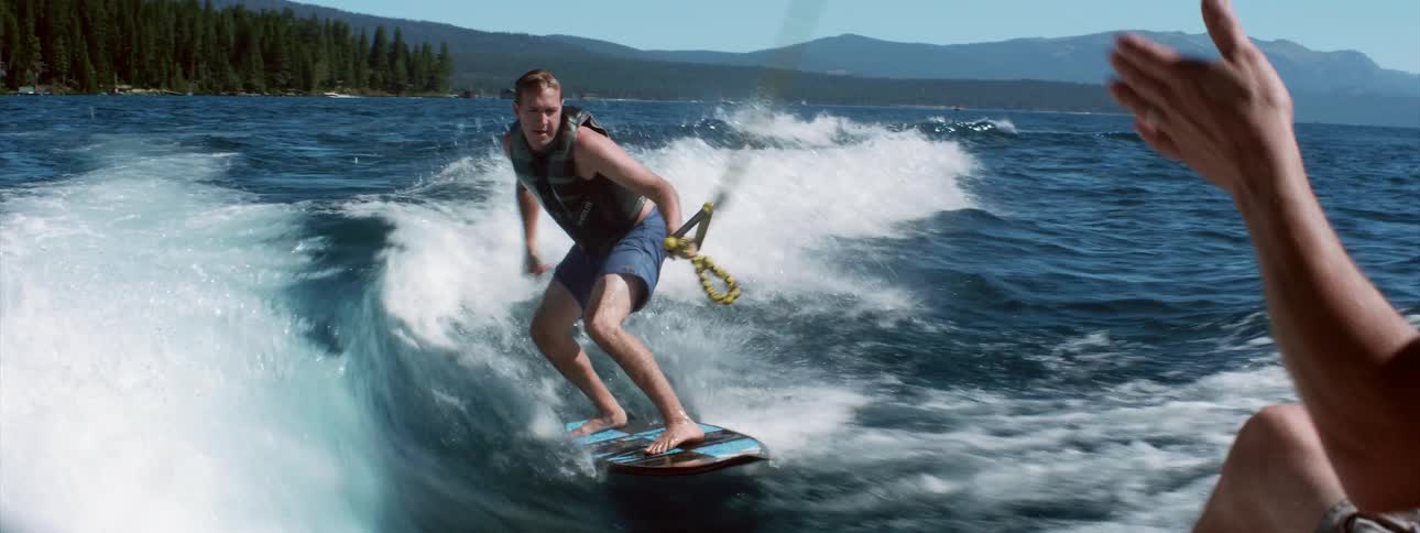 A man boards on the water