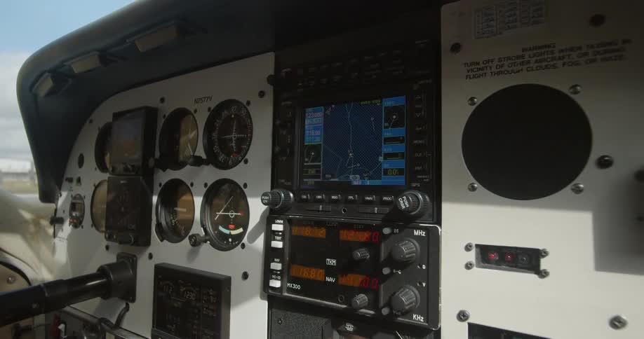 A woman operating a panel in an air vehicle