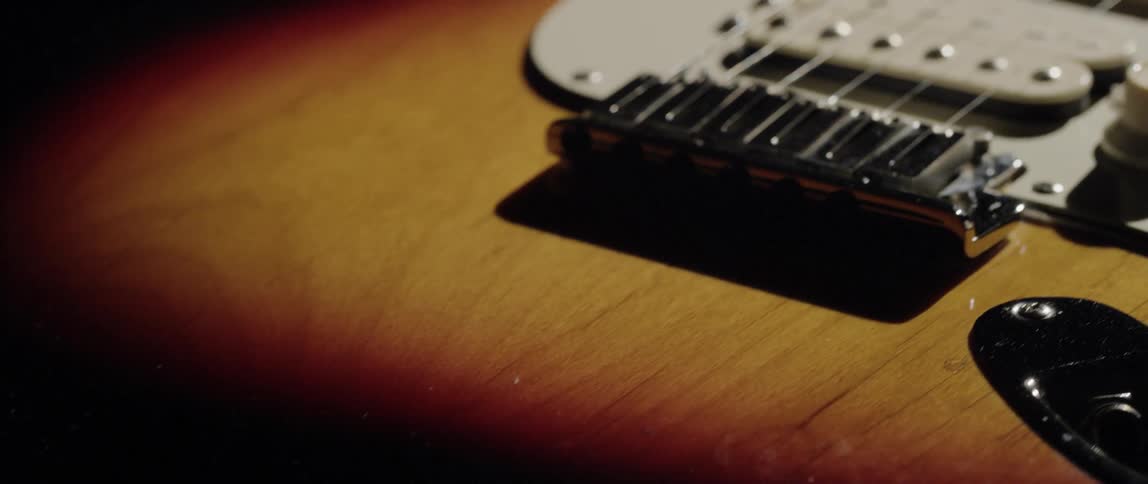 Light illuminates a guitar