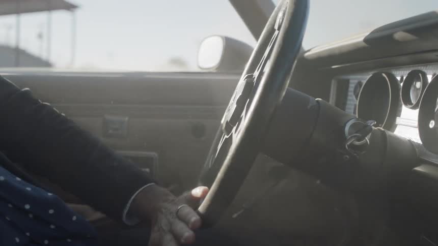 A man driving his car