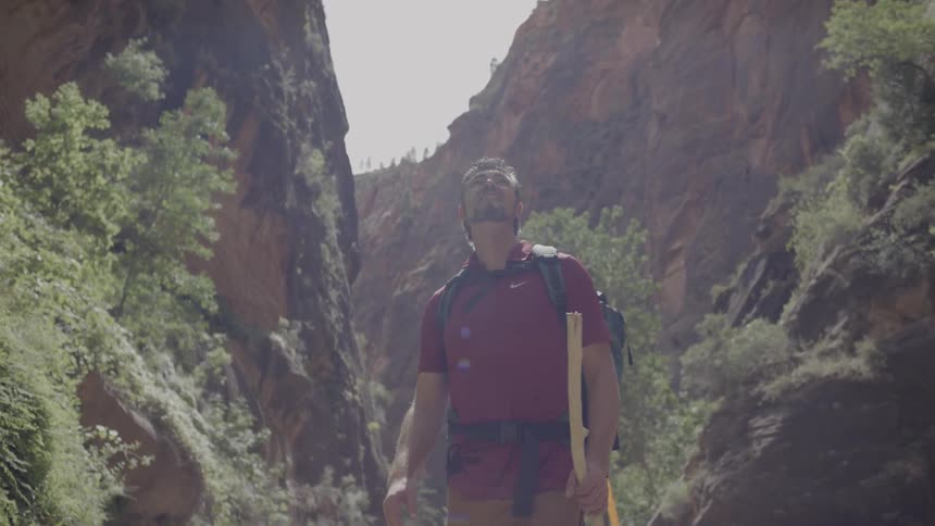 A man is hiking outdoors
