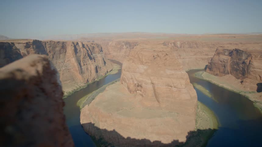 The water is in a ring at the bottom of the canyon