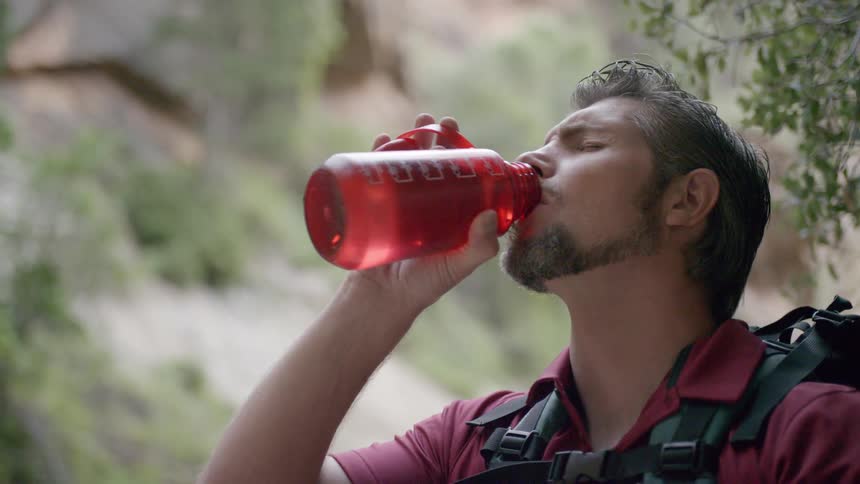 A man drinks water