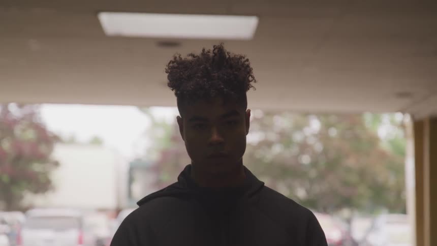 A man looking at a camera