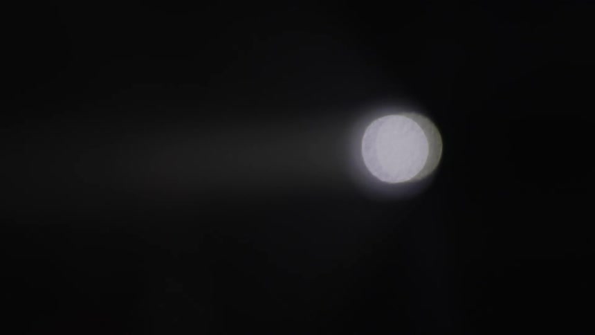 Circles of light glow then shine brightly at night