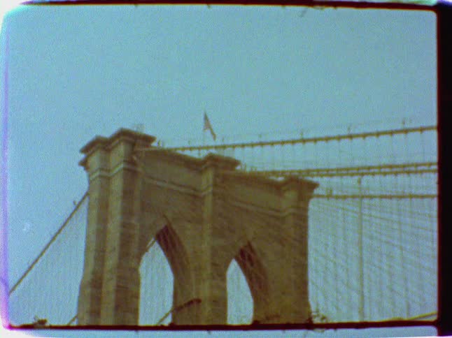Flag on top of the brooklyn bridge