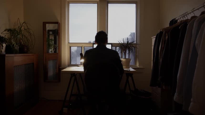 A man working with his laptop