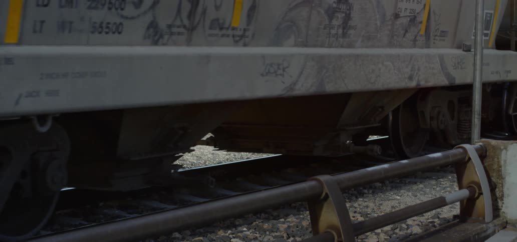 Train cartwheels rolling on a train track