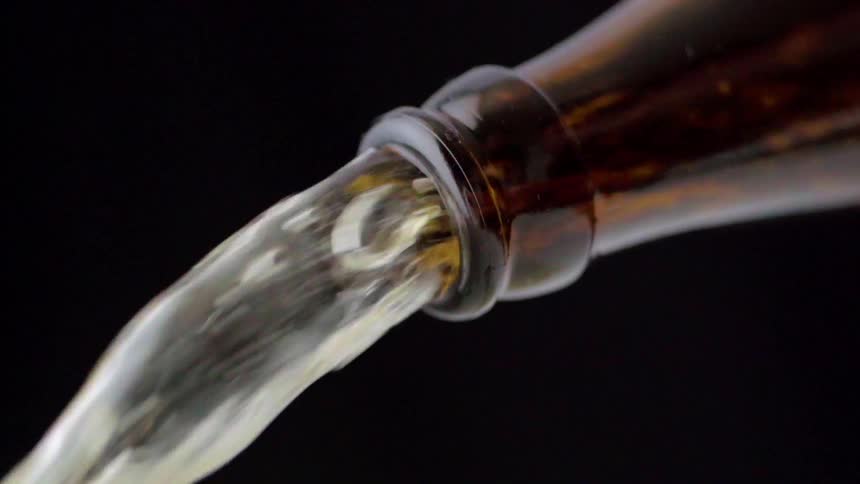 Liquid flowing out of a bottle