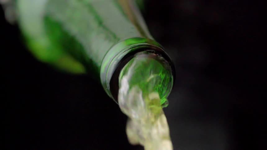 Liquid is being poured from a bottle