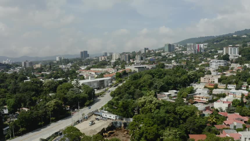 An aerial view of a city is displayed