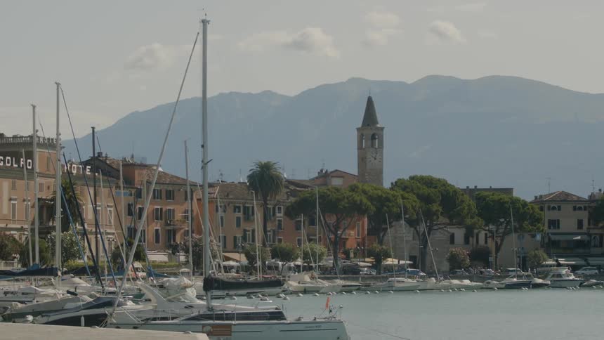 Boats are parked in a harbor