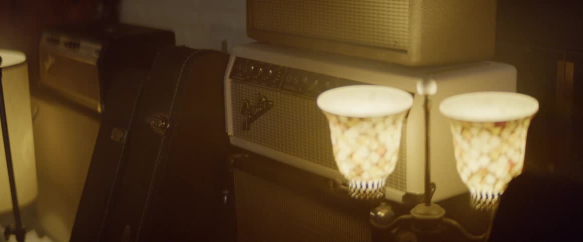 Amplifiers in a softly lit studio