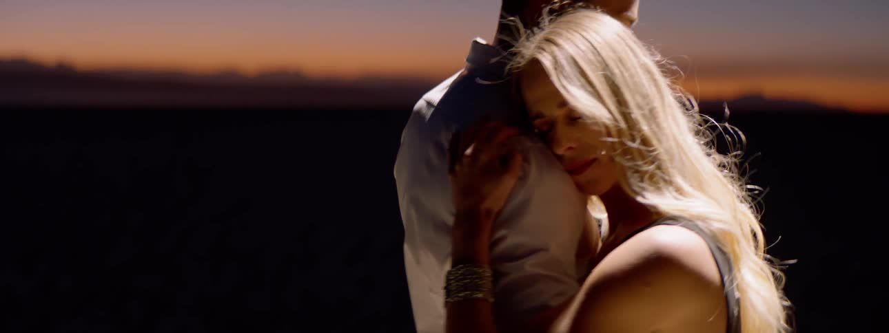 A couple dancing at dawn