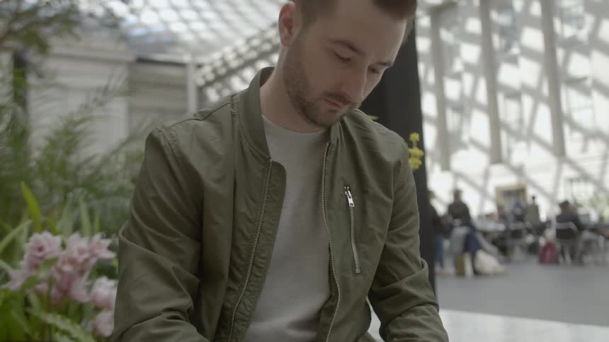 A man reads his phone