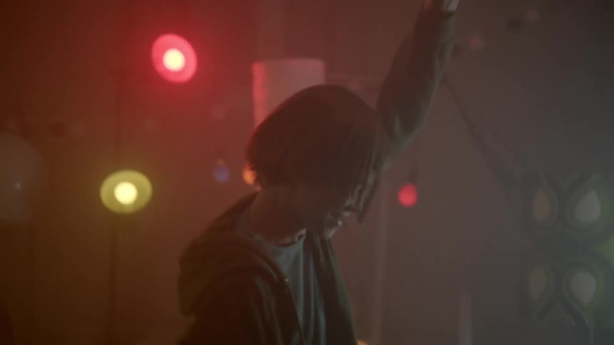 A teenager grabbing and opening a light