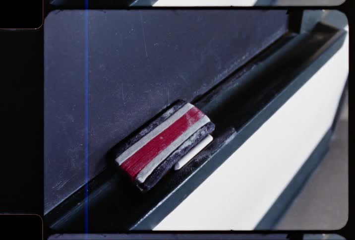A chalkboard eraser sits
