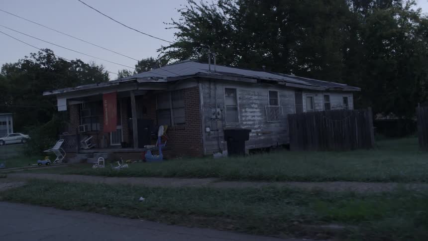 A car parked near a house